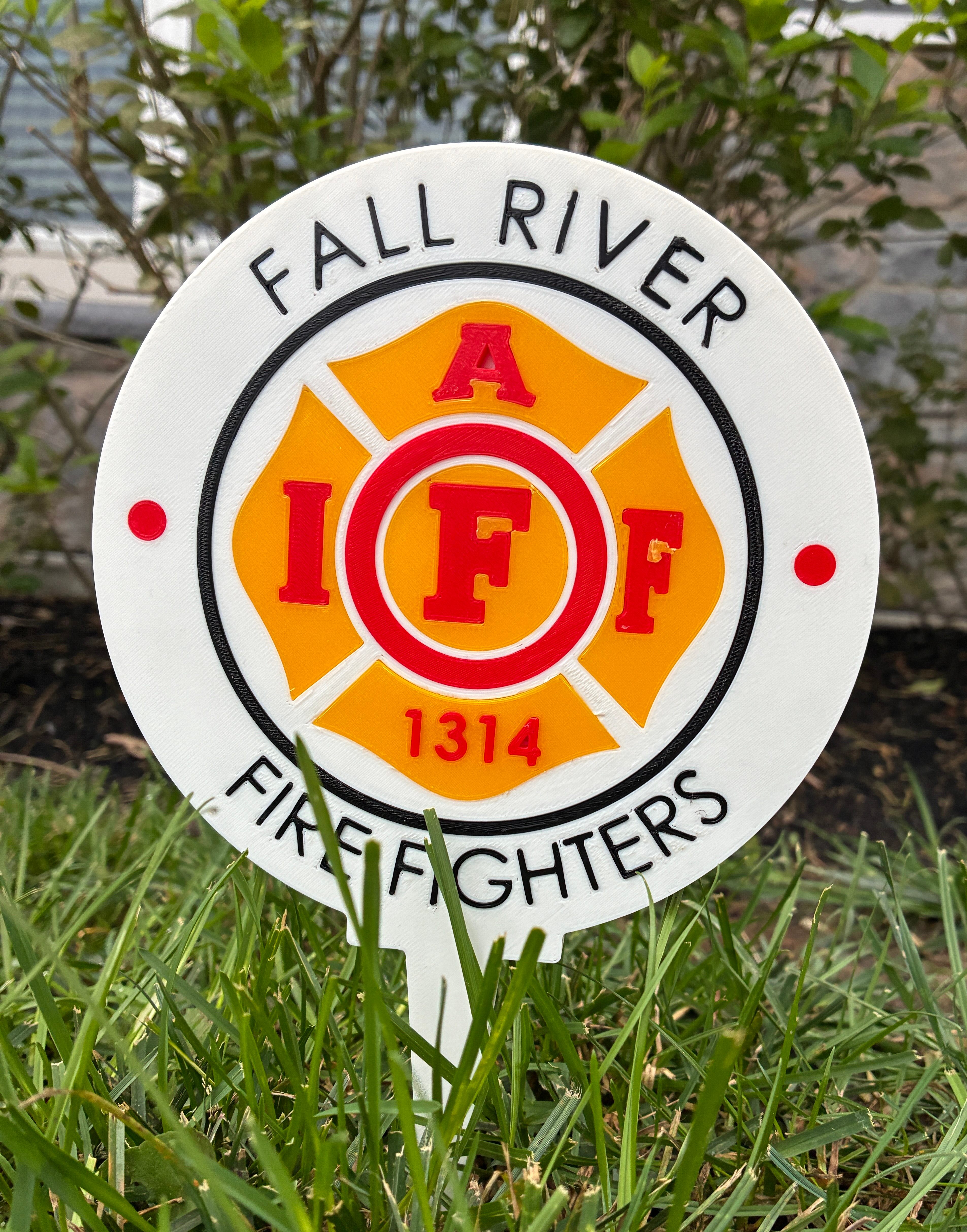 Custom white outdoor golf sign photographed in a grassy landscape
